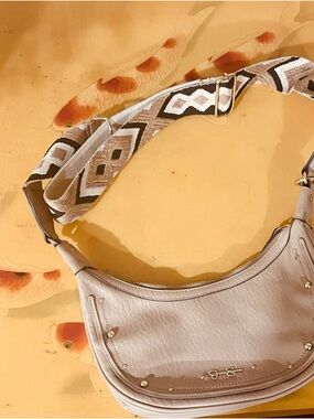 Jessica Simpson Light Beige Crescent Shoulder Bag with Patterned Strap